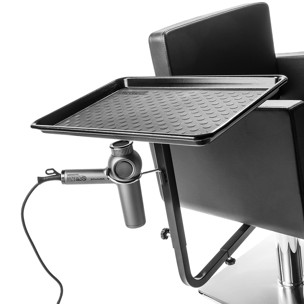 Swiveling metal tray that can be attached to a hairdressing chair