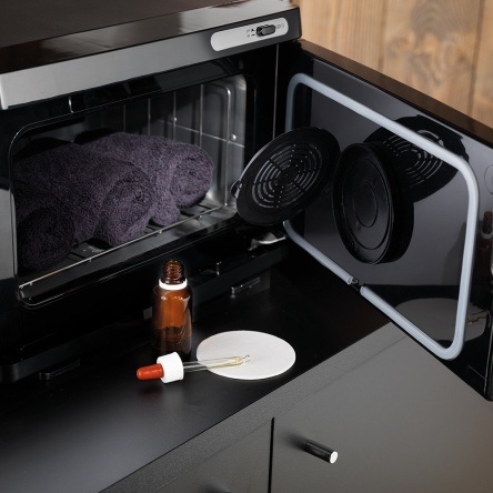 Compact black aroma therapy towel warmer