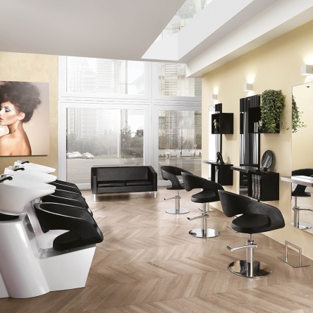 Wave washing unit with white base and black chair