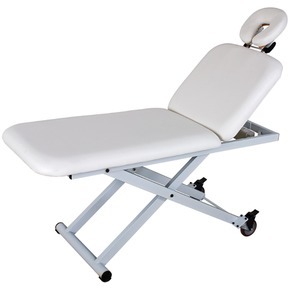 Electric beauty bed for massage and body treatments